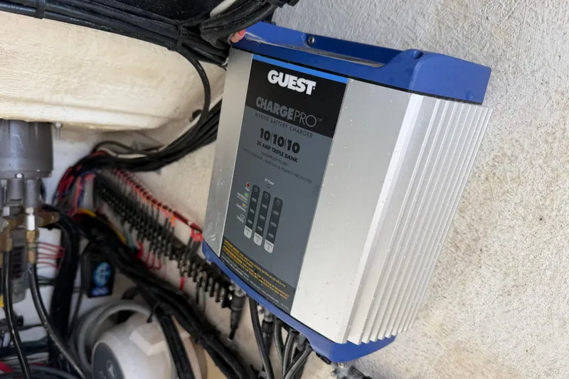 Slide: The Image of Marine battery charger installed on a Competition 31 boat, model year 2021. - 29