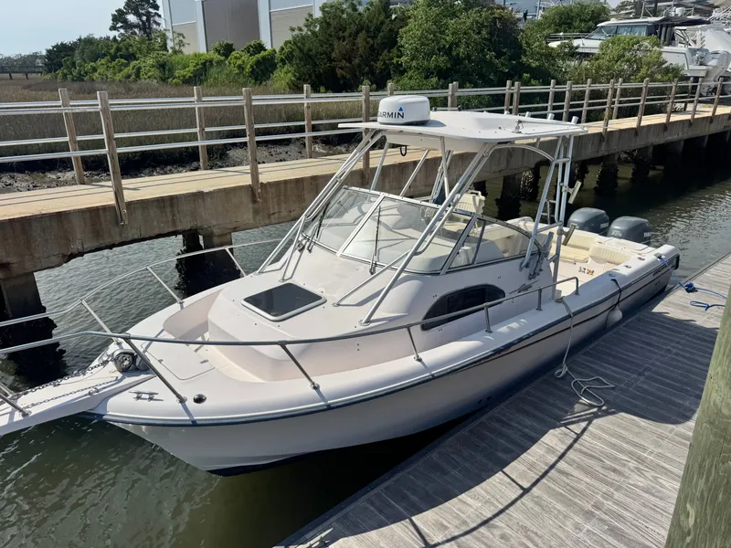 The Image of 2002 Grady-White Sailfish 282 boat docked on a sunny day. - 0