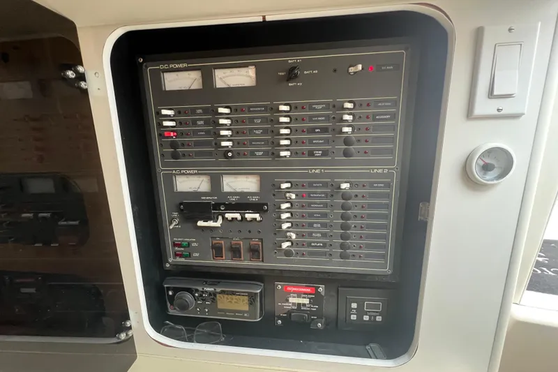 Slide: The Image of Electrical control panel on a 1993 Tiara Yachts 3100 Open boat. - 19