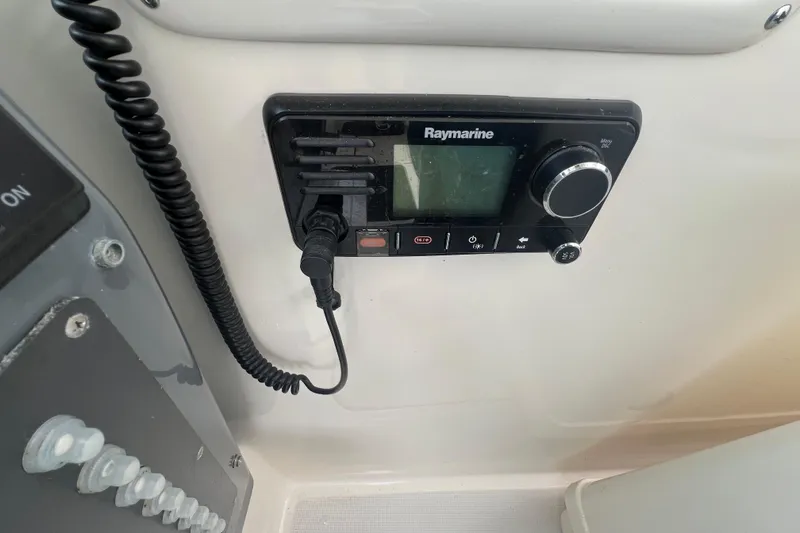 Slide: The Image of Raymarine marine radio on 1993 Tiara Yachts 3100 Open dashboard. - 8