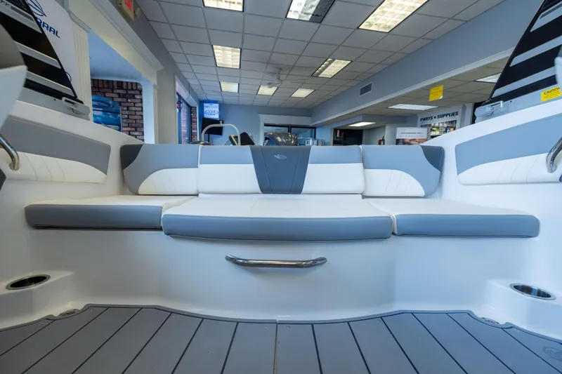 Slide: The Image of 2025 Chaparral 21 SSi OB boat interior with sleek seating and modern design. - 13