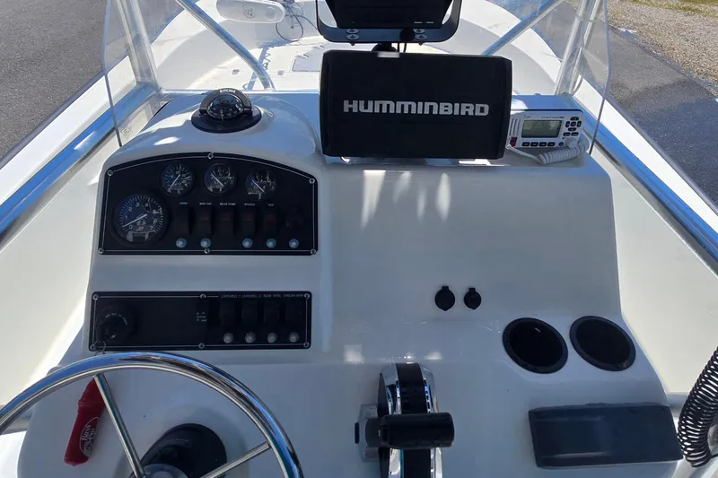 Slide: The Image of 2017 Boston Whaler 210 Montauk boat dashboard with Humminbird navigation system. - 11