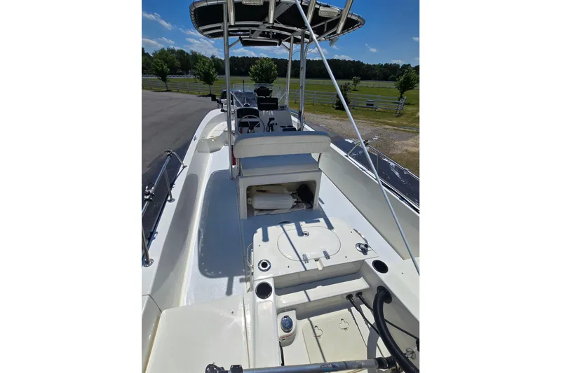 Slide: The Image of 2017 Boston Whaler 210 Montauk boat interior with seating and storage compartments. - 36