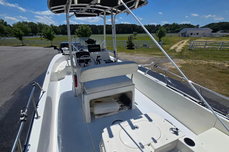 Slide: The Image of 2017 Boston Whaler 210 Montauk boat interior with steering console and seating. - 8