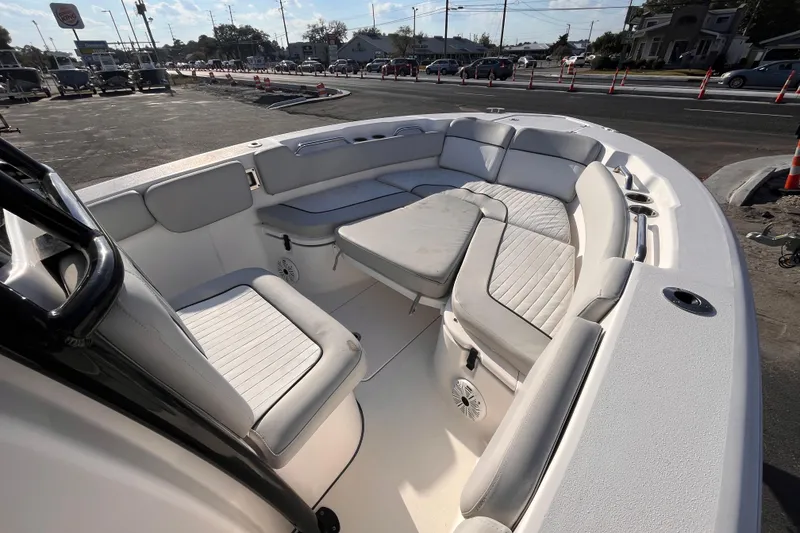 Slide: The Image of 2020 Sea Fox 248 Commander boat interior with cushioned seating and cup holders. - 13