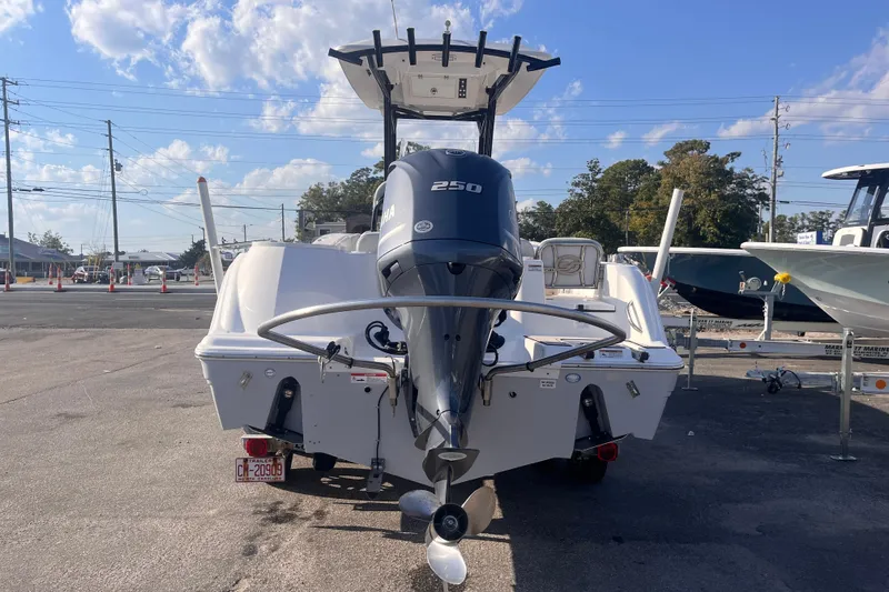 Slide: The Image of 2020 Sea Fox 248 Commander boat with Yamaha 250 engine, parked on a sunny day. - 4