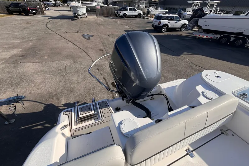 Slide: The Image of 2020 Sea Fox 248 Commander boat with Yamaha outboard motor in a marina parking lot. - 7