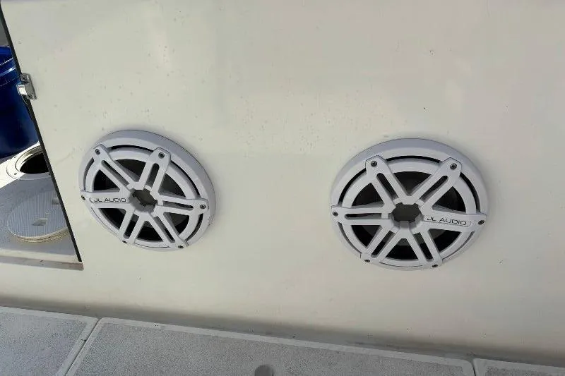 Slide: The Image of Speakers on a 1999 Contender 23 Open boat, featuring JL Audio marine speakers. - 15