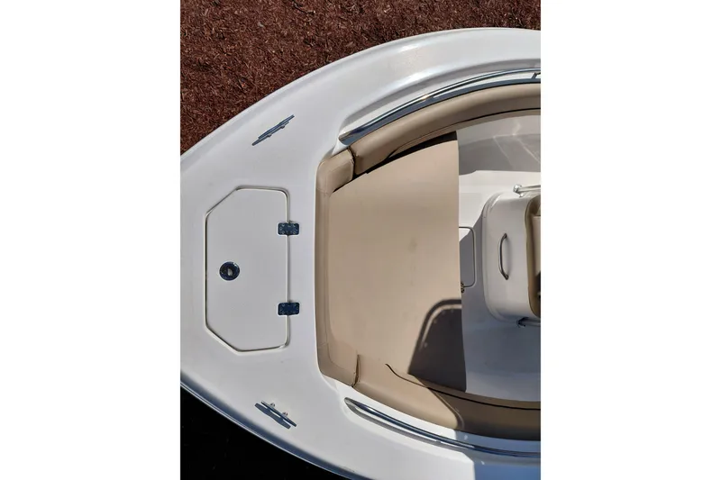 Slide: The Image of 2020 NauticStar 20 XS boat bow with seating and storage compartment. - 10