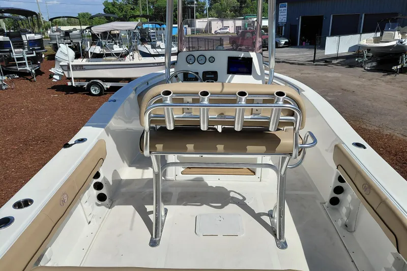 Slide: The Image of 2020 NauticStar 20 XS boat interior with seating and rod holders. - 33