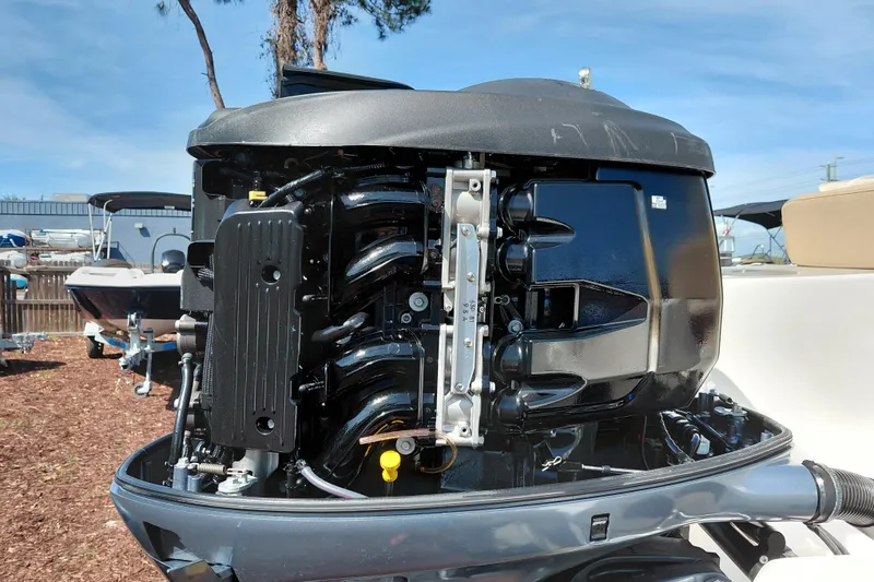 Slide: The Image of 2020 NauticStar 20 XS boat engine, detailed view of the motor components. - 37