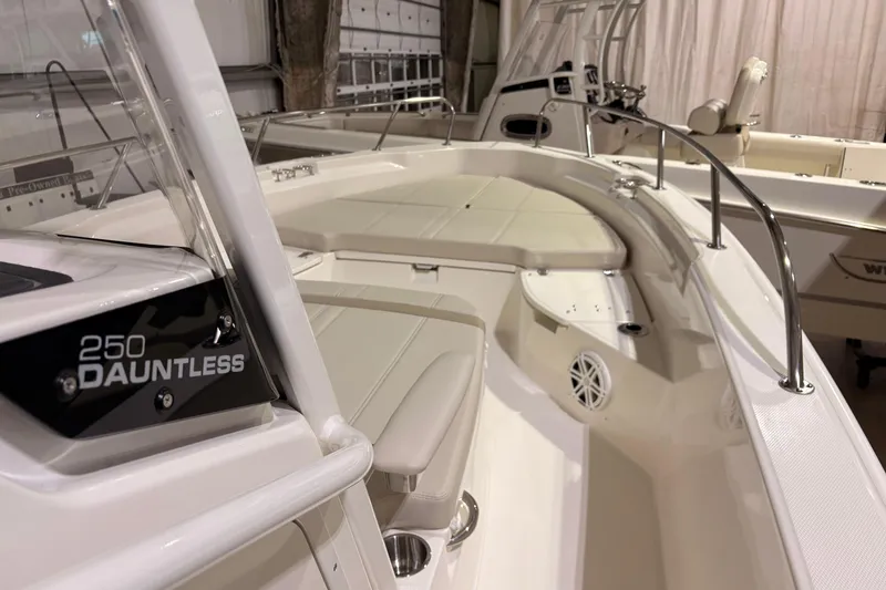 Slide: The Image of 2026 Boston Whaler 250 Dauntless boat interior, showcasing sleek seating and modern design. - 10