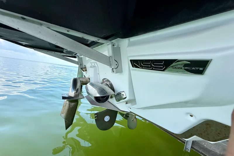 Slide: The Image of 2021 Nautique Super Air Nautique G21 boat with NSS waveplate in calm water. - 9