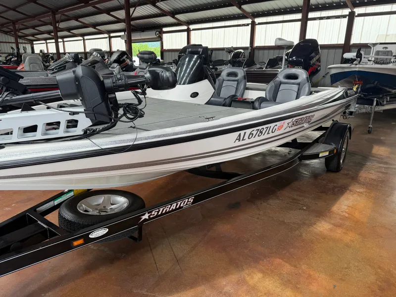 The Image of 2005 Stratos 294 Pro XL boat in storage facility. - 1