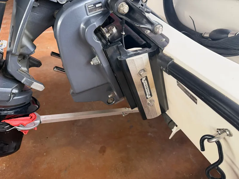 Slide: The Image of Close-up of a 2005 Stratos 294 Pro XL boat stern with motor. - 18
