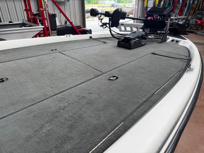 Slide: The Image of 2005 Stratos 294 Pro XL boat deck in a workshop. - 6