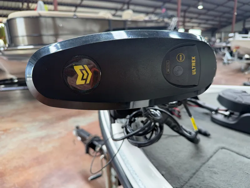 Slide: The Image of Close-up of a Minn Kota Ultrex motor on a Stratos 294 Pro XL boat. - 9