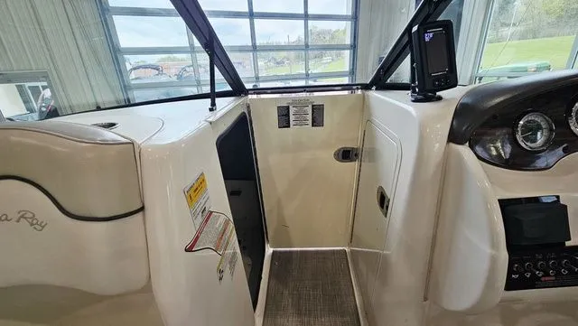 Slide: The Image of Interior view of a 2012 Sea Ray 200 Sundeck boat. - 21
