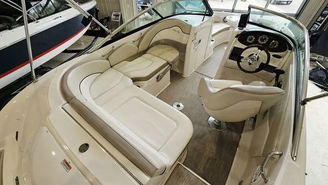 Slide: The Image of Interior view of a 2012 Sea Ray 200 Sundeck boat with luxurious seating. - 7