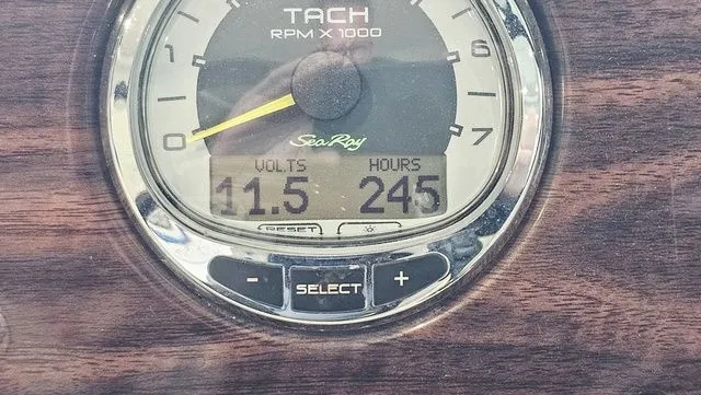 Slide: The Image of Sea Ray 200 Sundeck 2012 tachometer showing 11.5 volts and 245 hours. - 24