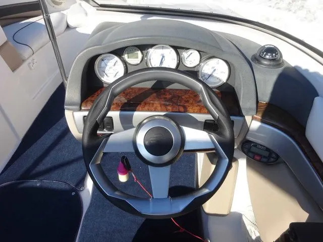 Slide: The Image of Interior view of 2006 Four Winns 200 Horizon boat cockpit. - 10