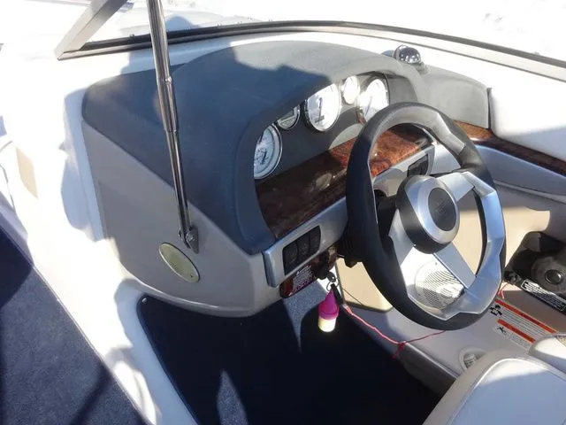 Slide: The Image of Interior view of 2006 Four Winns 200 Horizon cockpit. - 11