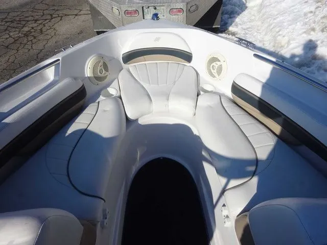 Slide: The Image of Interior of a 2006 Four Winns 200 Horizon boat with white seating. - 14