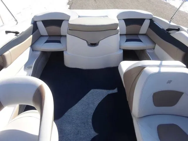 Slide: The Image of Interior of a 2006 Four Winns 200 Horizon boat, beige and white upholstery. - 15