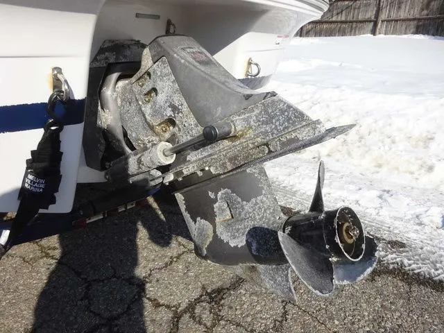 Slide: The Image of 2006 Four Winns 200 Horizon boat motor with visible wear. - 17
