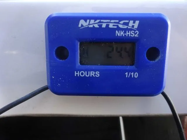 Slide: The Image of NKTECH hour meter displaying 244 hours on a 2006 Four Winns 200 Horizon. - 19