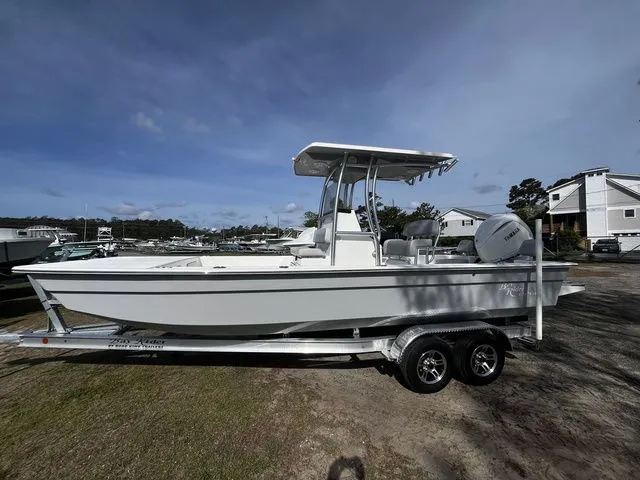 Slide: The Image of 2026 Bay Rider 2260 boat on trailer outdoors. - 3