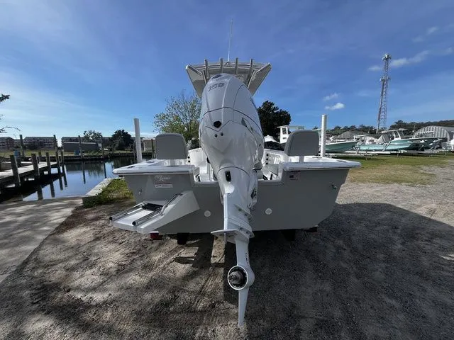 Slide: The Image of Bay Rider 2260 boat from 2026 parked by the shore. - 5