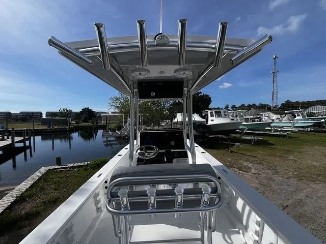 Slide: The Image of Bay Rider 2260 boat 2026 at dock with clear view. - 11