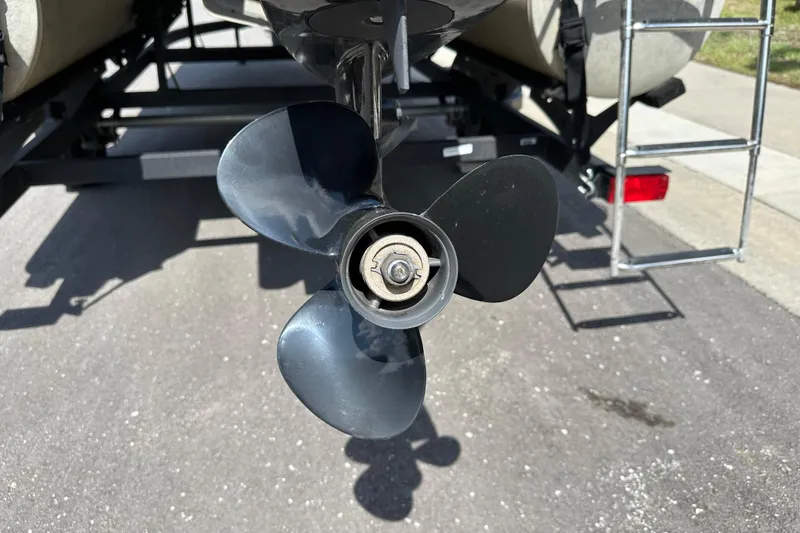 Slide: The Image of 2024 Sun Tracker Bass Buggy 16 XL Select boat propeller and ladder detail. - 10