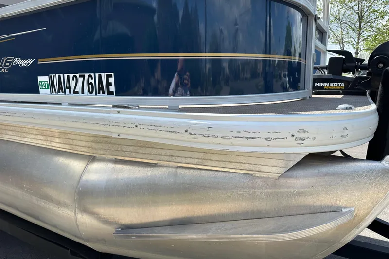 Slide: The Image of 2024 Sun Tracker Bass Buggy 16 XL Select pontoon boat with visible registration number. - 14