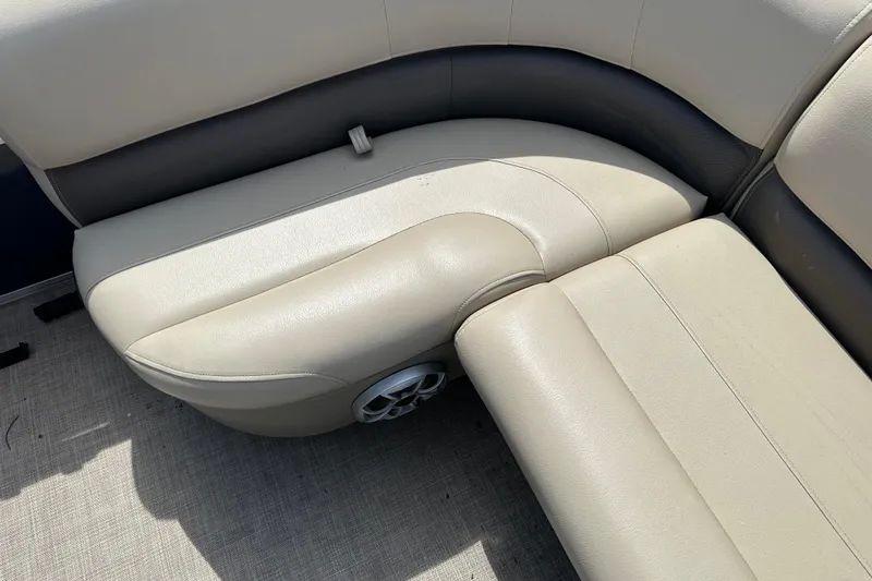 Slide: The Image of 2024 Sun Tracker Bass Buggy 16 XL Select boat seating, featuring beige and black upholstery. - 25