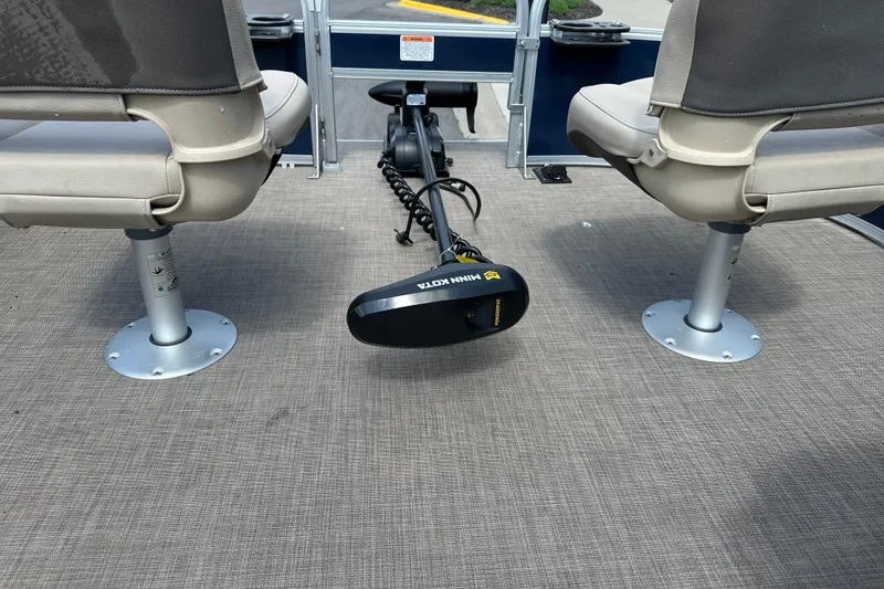 Slide: The Image of 2024 Sun Tracker Bass Buggy 16 XL Select interior with Minn Kota trolling motor. - 28