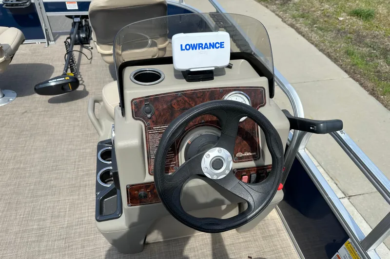 Slide: The Image of 2024 Sun Tracker Bass Buggy 16 XL Select steering console with Lowrance fish finder. - 32