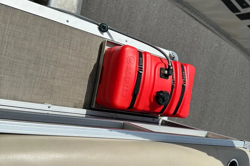 Slide: The Image of Red fuel tank on 2024 Sun Tracker Bass Buggy 16 XL Select boat deck. - 38