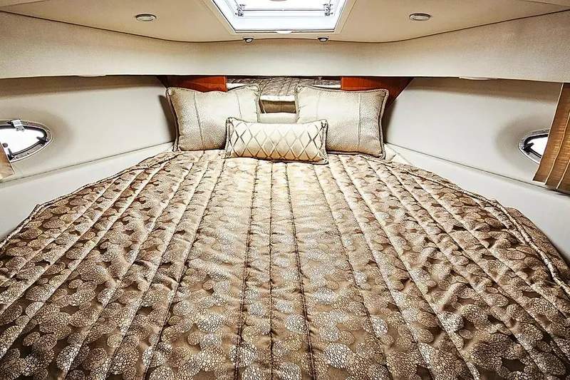 Slide: The Image of Luxurious cabin interior of a 2006 Formula 37 Performance Cruiser with elegant bedding. - 18