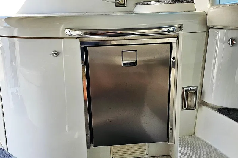 Slide: The Image of Stainless steel refrigerator on 2006 Formula 37 Performance Cruiser yacht interior. - 23