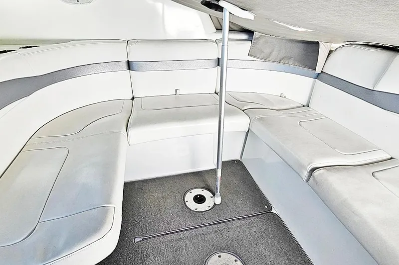 Slide: The Image of Interior seating of 2006 Formula 37 Performance Cruiser, featuring white and gray upholstery. - 24