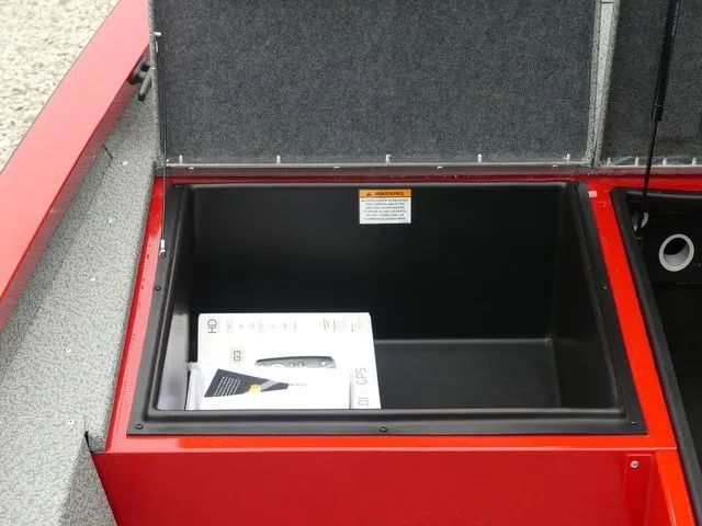 Slide: The Image of Open storage compartment in G3 Sportsman 1710 boat, year 2026. - 21