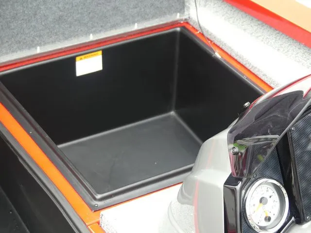 Slide: The Image of Interior of G3 Sportsman 1710 boat, storage compartment and dashboard, year 2026. - 23