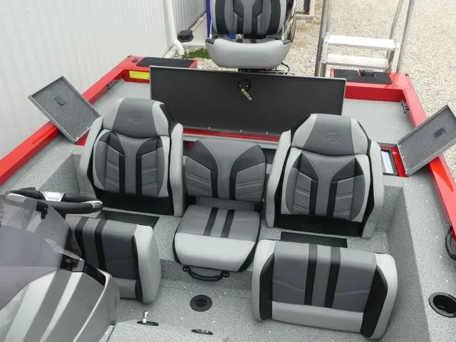 Slide: The Image of Interior of 2026 G3 Sportsman 1710 boat with gray and black seating. - 27