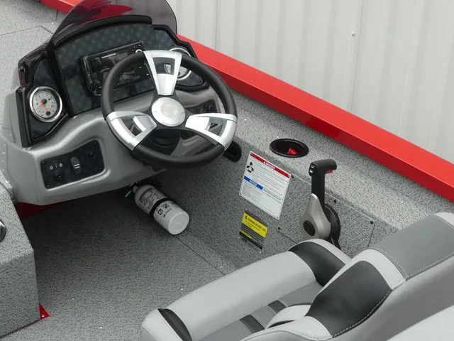 Slide: The Image of Interior of 2026 G3 Sportsman 1710 boat with steering wheel and control console. - 30