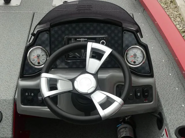 Slide: The Image of Steering wheel and dashboard of G3 Sportsman 1710 boat, year 2026. - 31