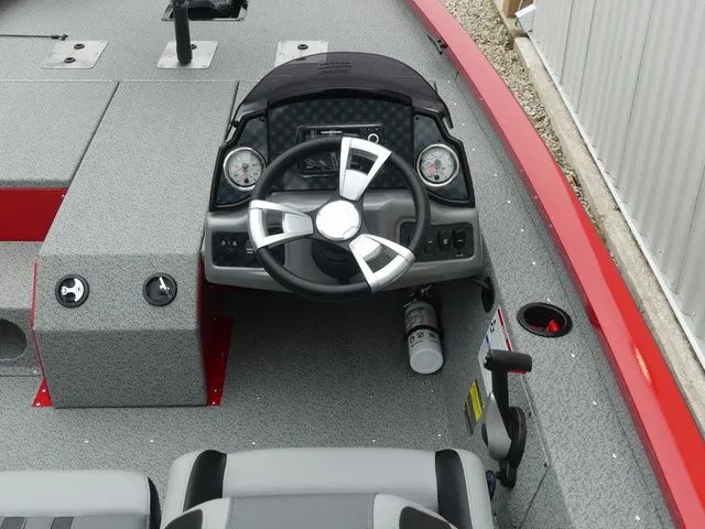 Slide: The Image of Interior view of 2026 G3 Sportsman 1710 boat with steering console. - 32