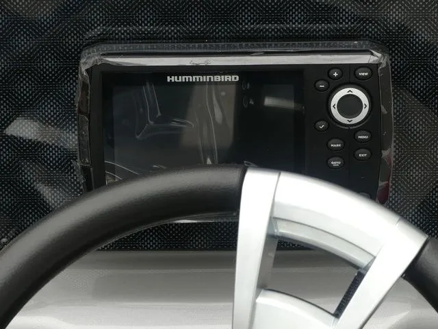 Slide: The Image of Steering wheel and Humminbird display in G3 Sportsman 1710, year 2026. - 35