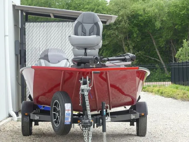 Slide: The Image of Red 2026 G3 Sportsman 1710 boat parked on trailer. - 4
